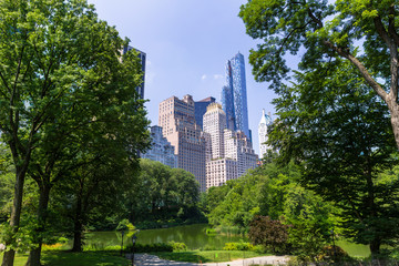 Canvas schilderij Central Park The Pond met Manhattan skyline  © lunamarina