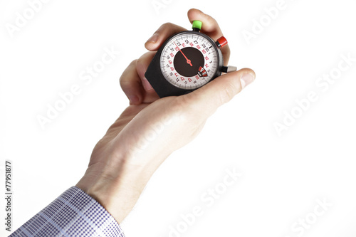 Hand holding a chronometer