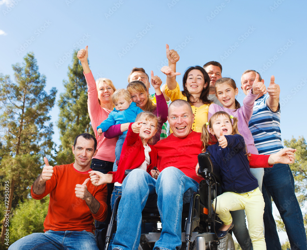 Obraz premium Disabled Man with family outside.