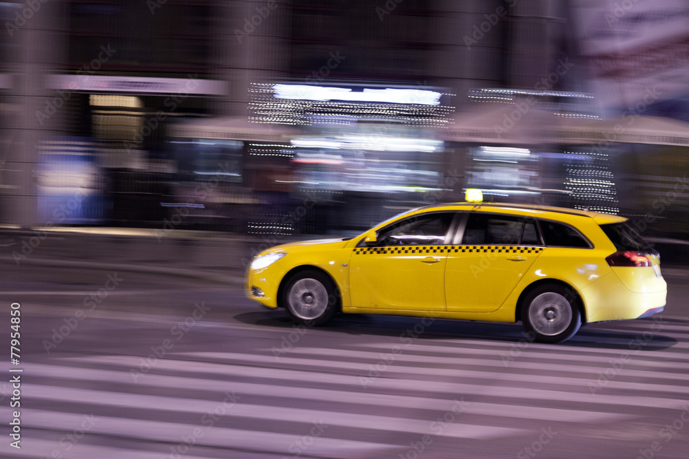 yellow taxi moves on the night city street yellow taxi moves on the night city street