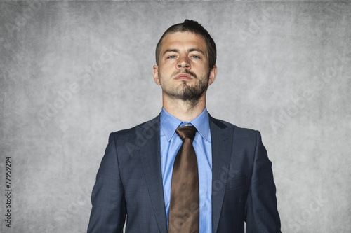 serious man with a funny haircut