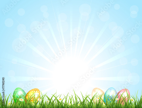 Sunny background with Easter eggs