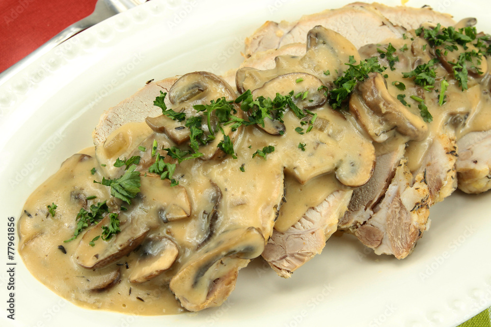 rôti de porc sauce champignons Stock Photo | Adobe Stock