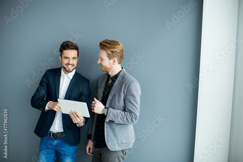 Young men with tablet