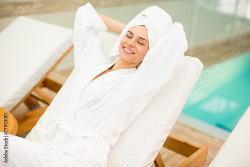 Fototapeta Young woman by the pool