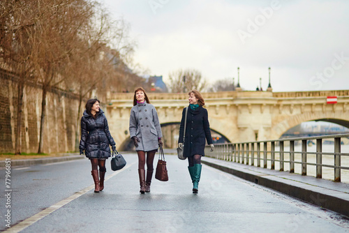 Three cheerful girls walking together in Paris © Ekaterina Pokrovsky