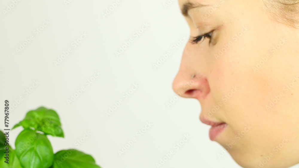 Girl sniffing to Basil Girl sniffing to Basil