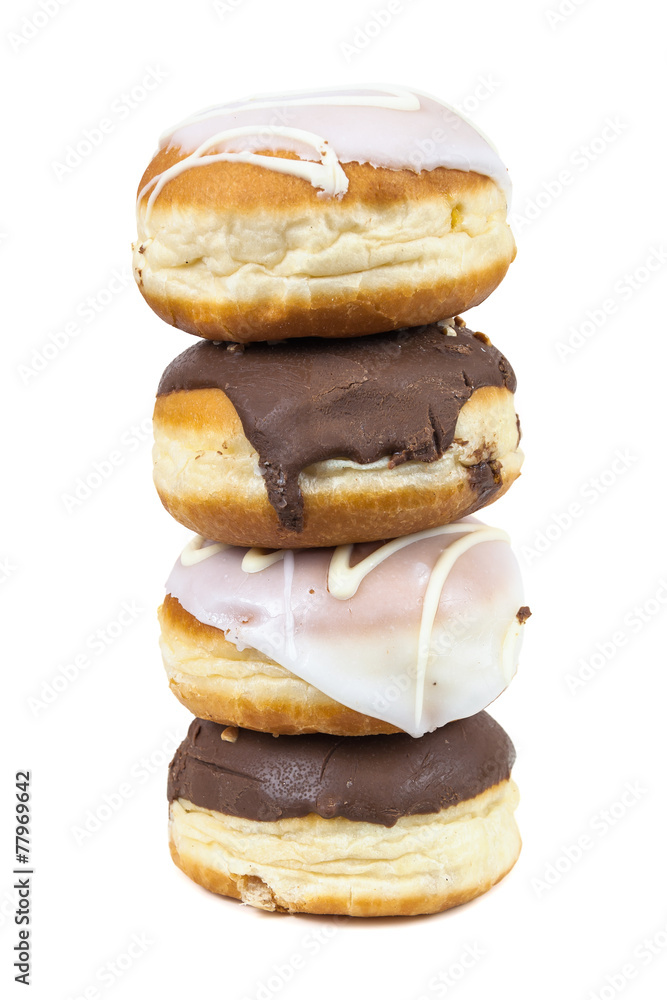 Stack of glazed and chocolate donuts Stack of glazed and chocolate donuts