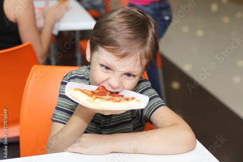 Boy and pizza