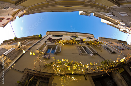 Old houses at backstreets of Piran, coastal town in Istria