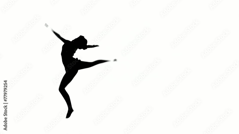 Young girl doing gymnastics , isolated over white Young girl doing gymnastics , isolated over white