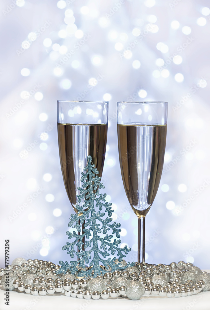 christmas toys, wine glasses and New Year's fir-tree lights christmas toys, wine glasses and New Year's fir-tree lights