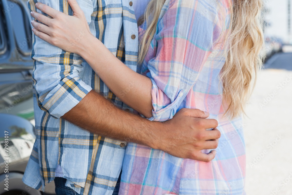 Cute couple standing and hugging