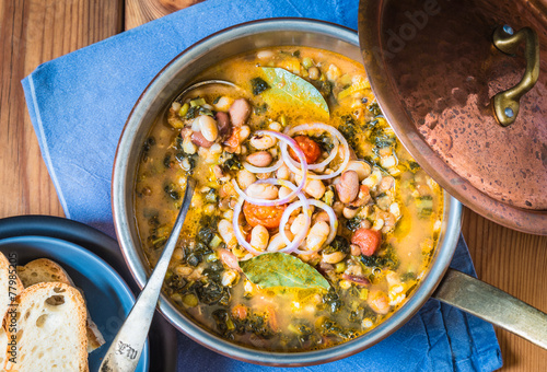 Soup with different vegetables, beans, kale, tuscan soup. photo