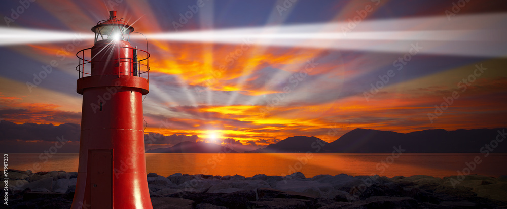 Red Lighthouse with Light Beam at Sunset - obrazy, fototapety, plakaty 