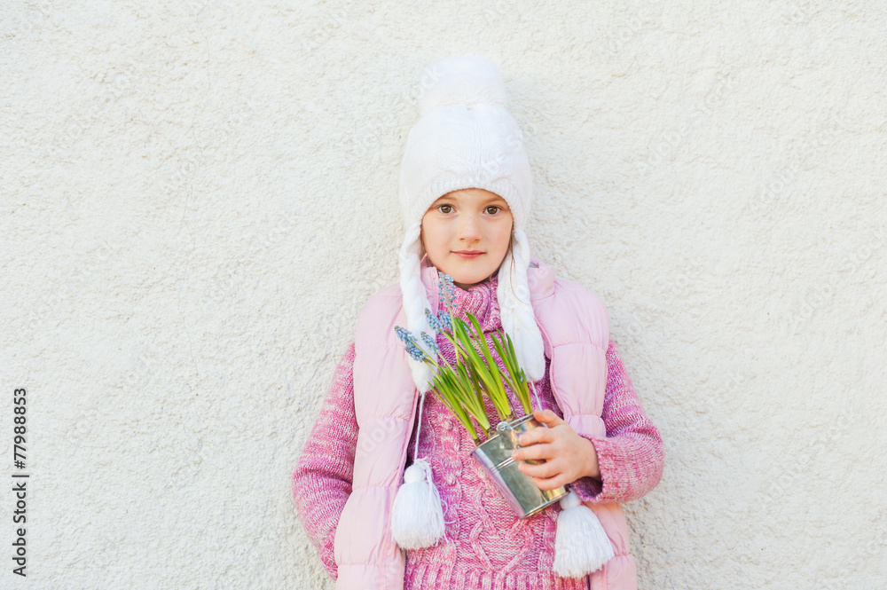 Outdoor portrait of a cute little girl