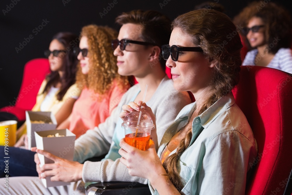 Young friends watching a 3d film Young friends watching a 3d film