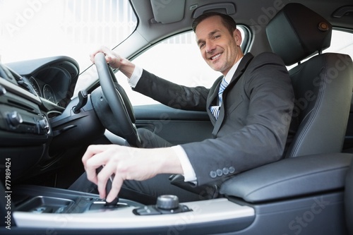 Smiling businessman in the drivers seat © WavebreakMediaMicro