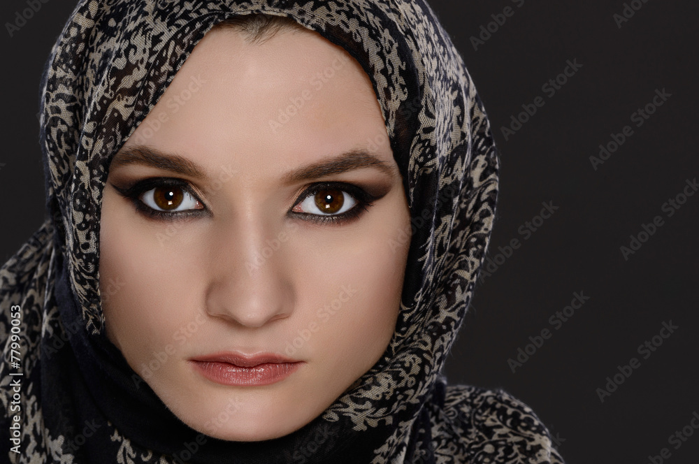 Portrait of a front view of a beautiful arab woman face Portrait of a front view of a beautiful arab woman face