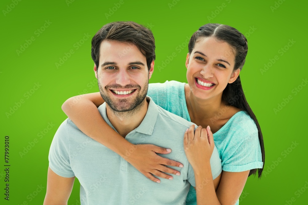 Fototapeta premium Composite image of cute couple smiling at camera