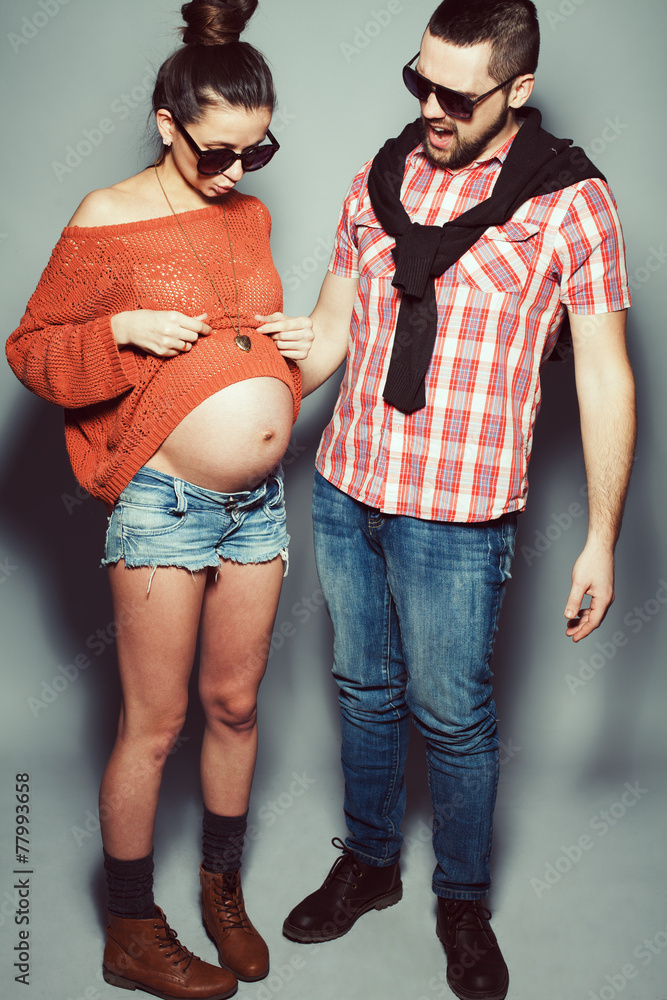 Stylish pregnancy & family concept: portrait of funny couple Stock Photo |  Adobe Stock