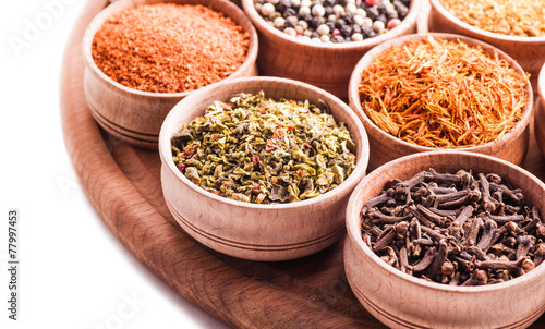 spices in a wooden bowl close-up