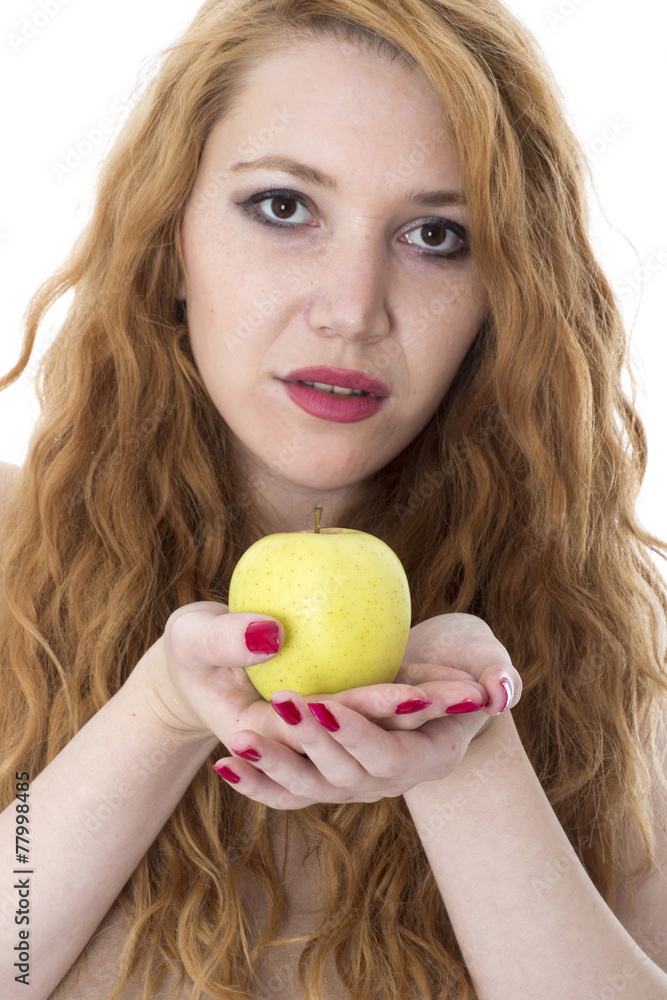 Model Released. Young Woman Holding a Green Apple Model Released. Young Woman Holding a Green Apple