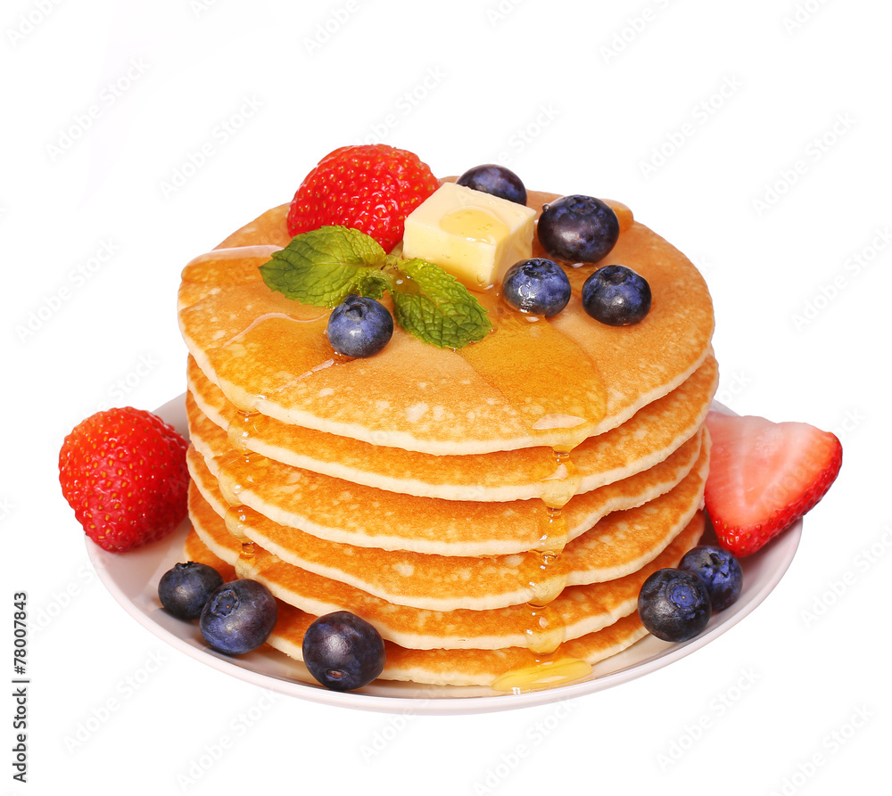 Pancakes with Strawberry and Blueberry isolated on white Pancakes with Strawberry and Blueberry isolated on white
