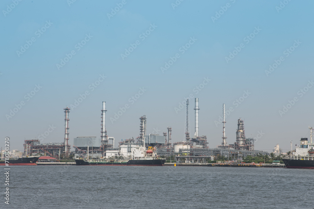 Oil refinery plant with blue sky background
