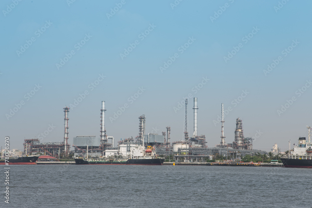 Oil refinery plant with blue sky background Oil refinery plant with blue sky background