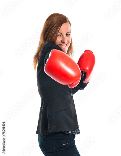 Business woman with boxing gloves