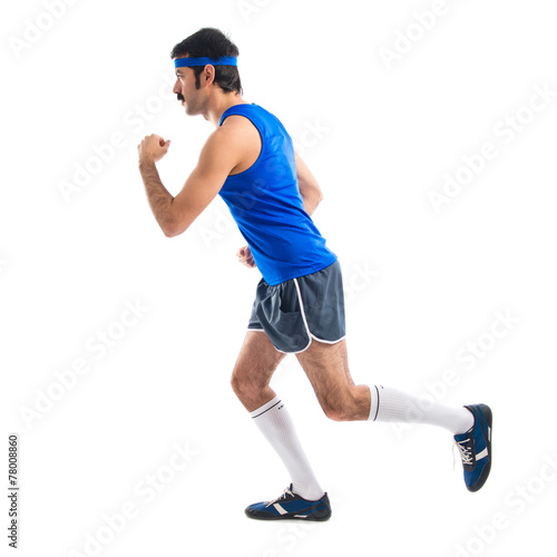 Vintage runner running fast © luismolinero