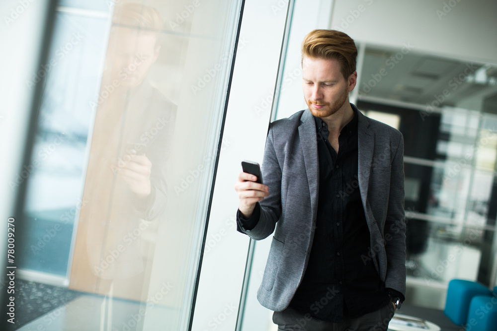 Young man with mobile phone Young man with mobile phone