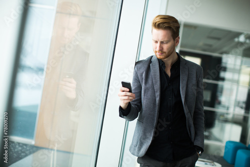Young man with mobile phone