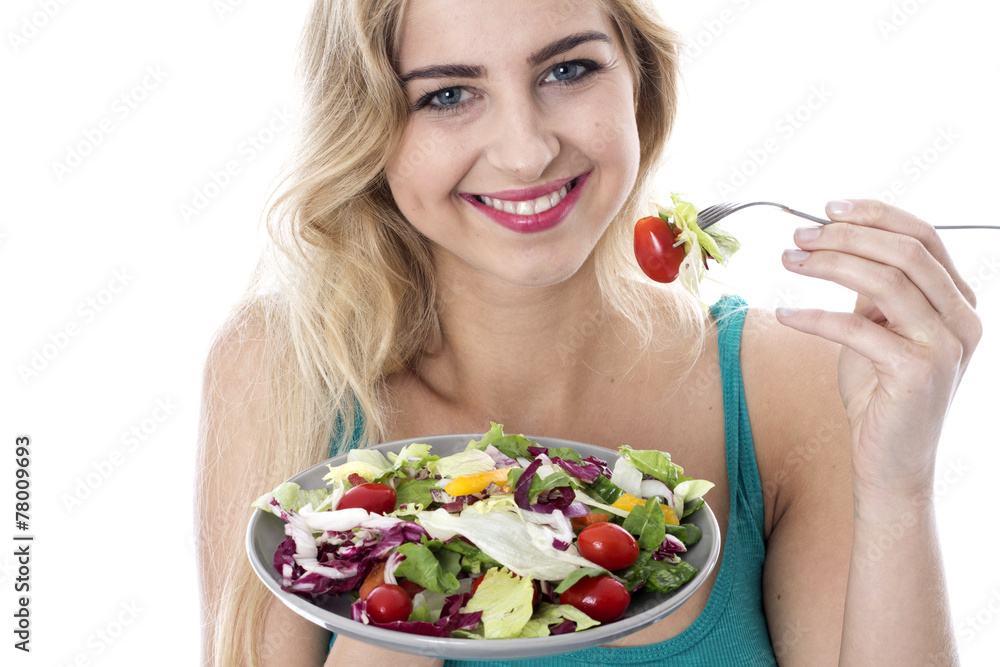 Model Released. Attractive Happy Young Woman Eating Salad Model Released. Attractive Happy Young Woman Eating Salad