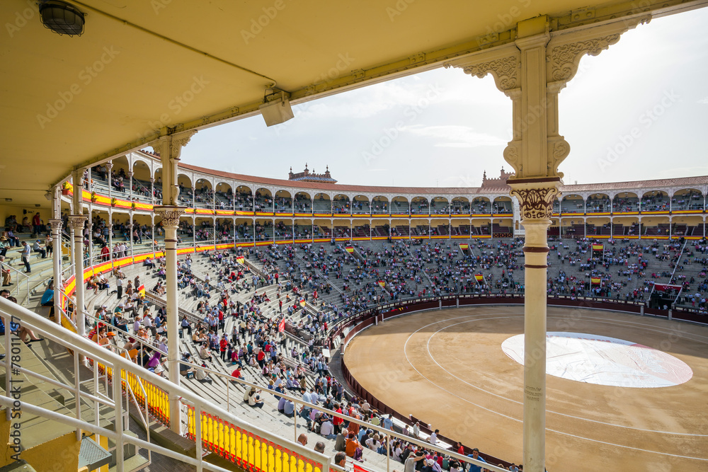 Fototapeta premium Plaza de Toros de Las Ventas interior view with tourists gatheri