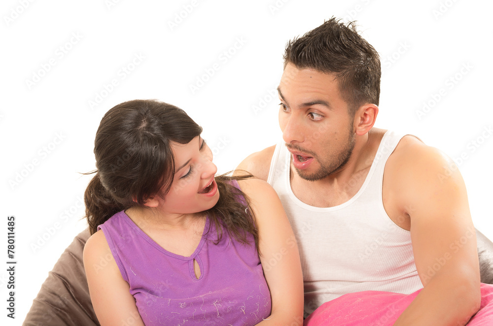 sweet latin couple looking at each other wearing their pijamas sweet latin couple looking at each other wearing their pijamas