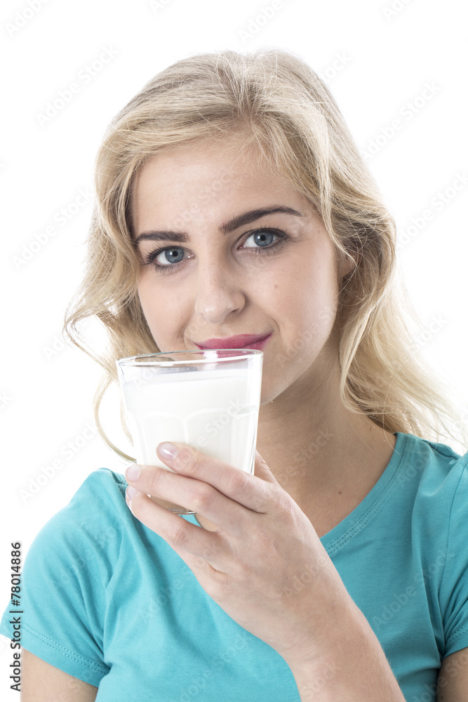 Attractive Young Woman Drinking a Glass of Milk Attractive Young Woman Drinking a Glass of Milk
