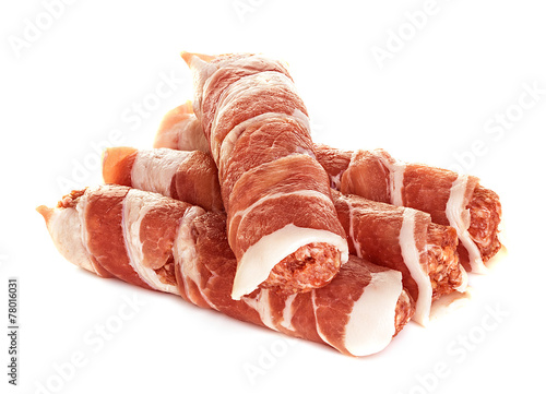 sausages wrapped in bacon, chevapchichi isolated  photo