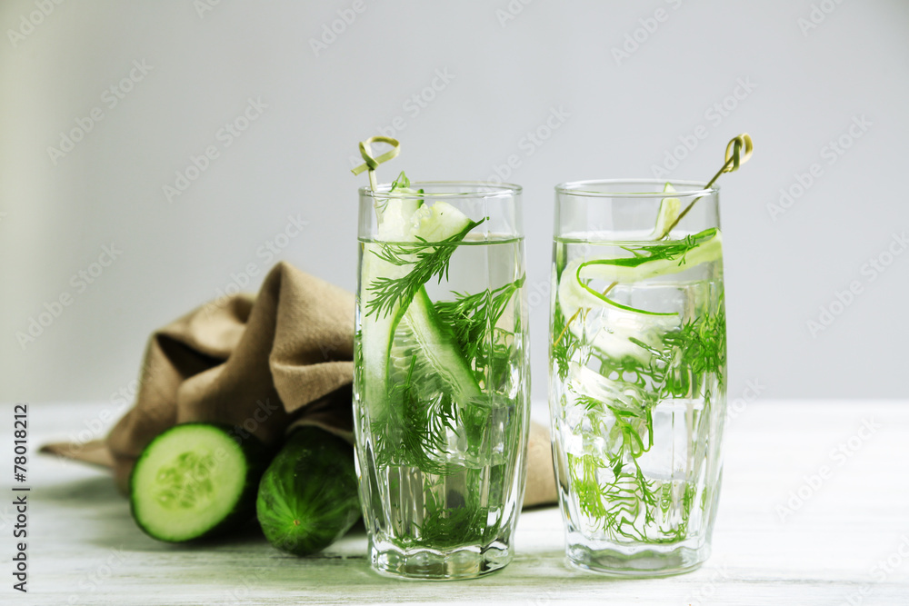 Glasses with fresh organic cucumber water Glasses with fresh organic cucumber water