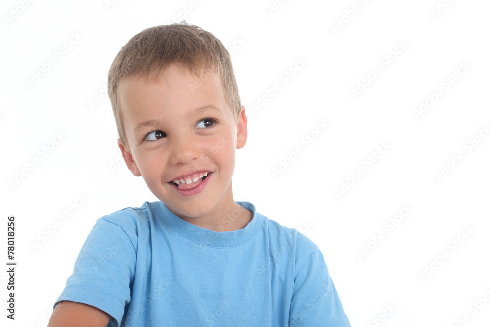 happy boy on a white background looking to the side happy boy on a white background looking to the side