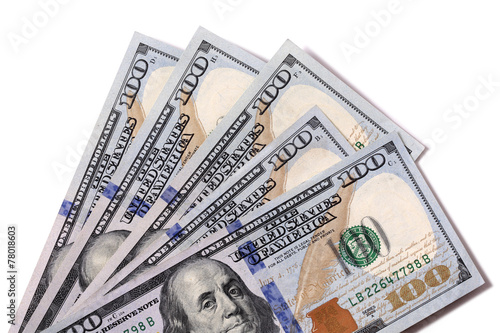 Fan group of several US hundred dollar $100 bills isolated on white background photo