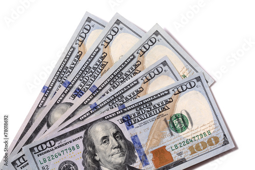 Fan group of several US hundred dollar $100 bills isolated on white background photo