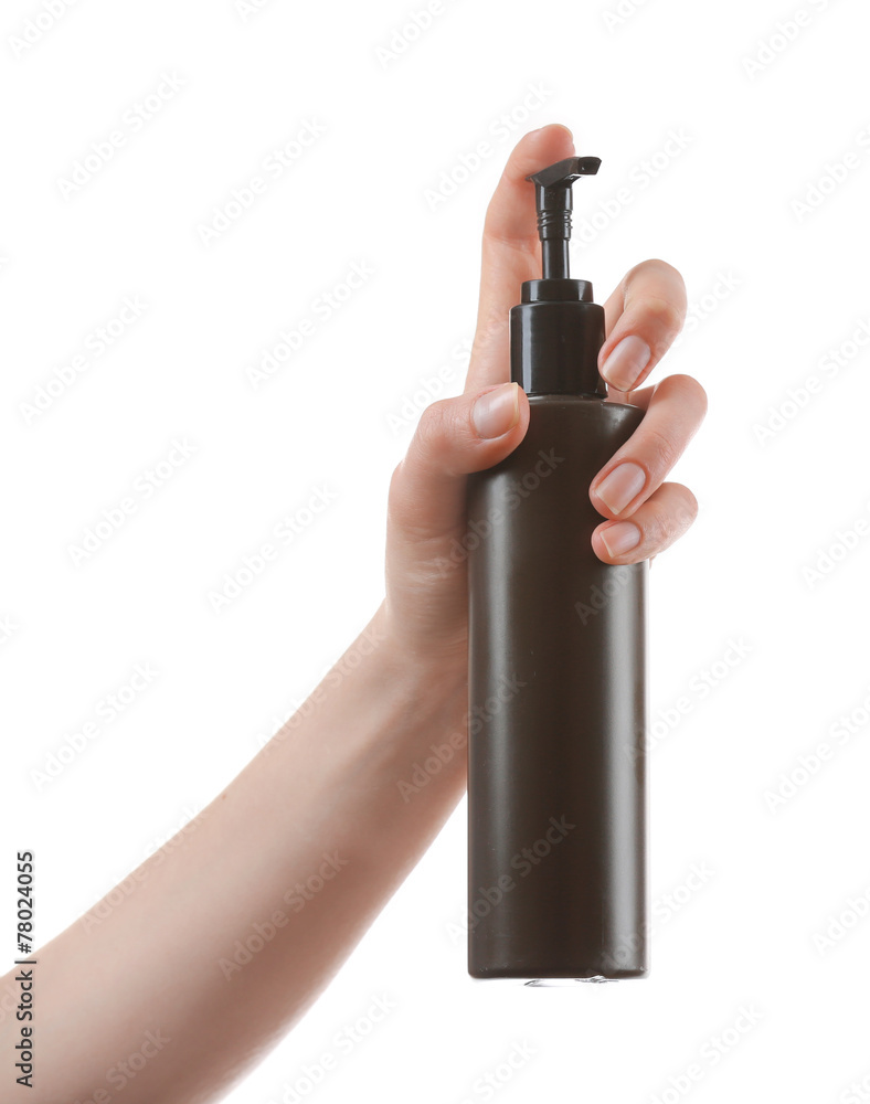 Female hand with cosmetics bottle isolated on white Female hand with cosmetics bottle isolated on white