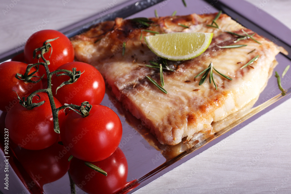 Dish of Pangasius fillet with rosemary and lime
