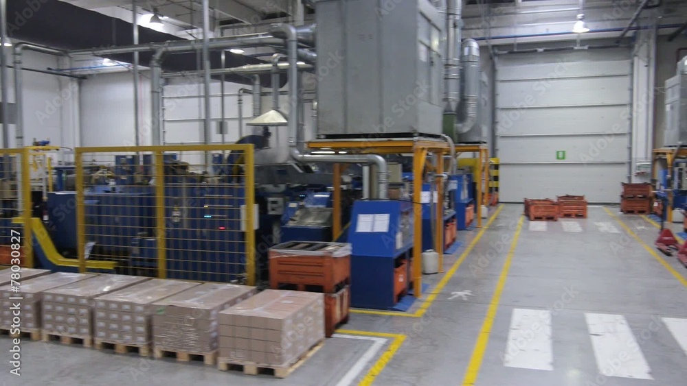 Flying over the production line in modern factory. Flying over the production line in modern factory.