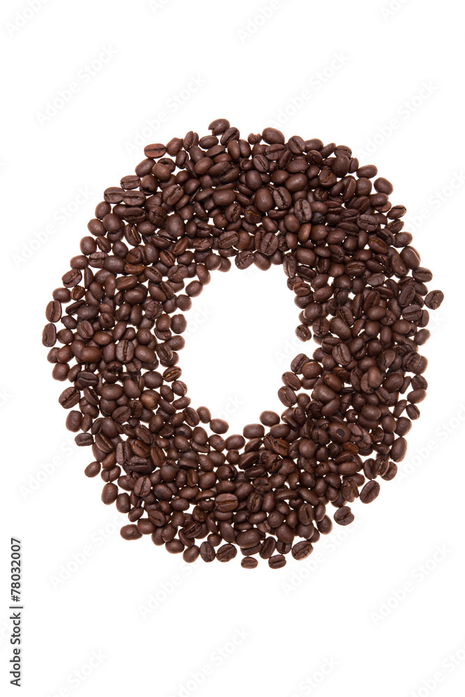 Roasted coffee beans placed in the shape of number zero Roasted coffee beans placed in the shape of number zero