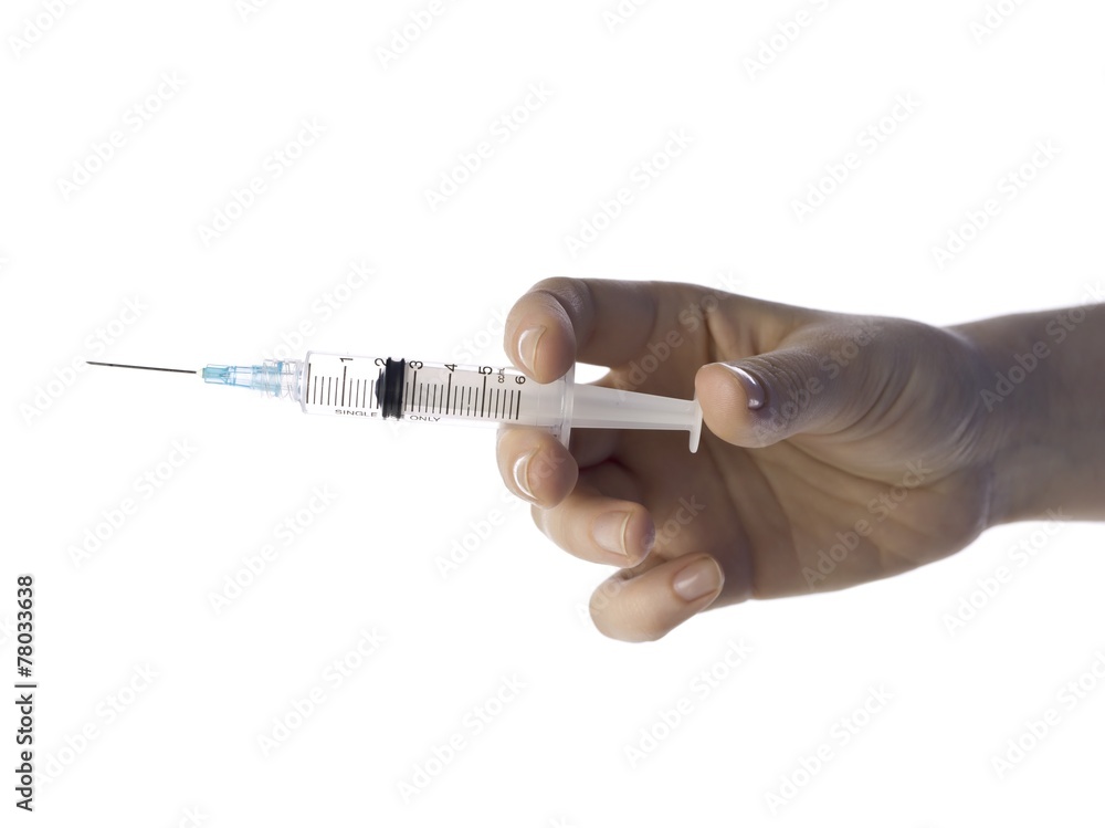 human hand with syringe human hand with syringe
