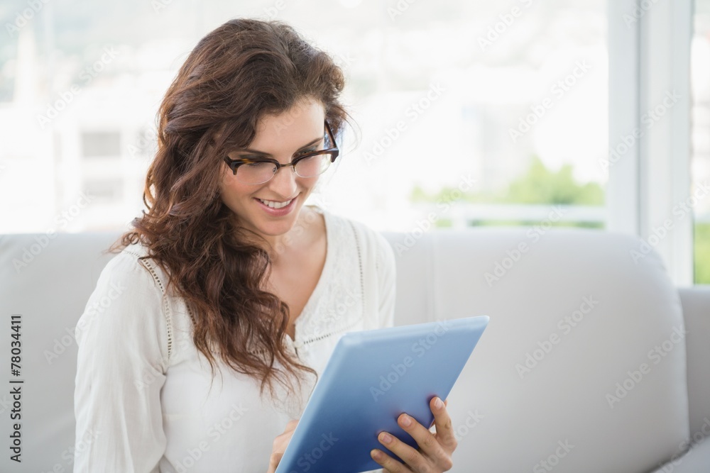 Pretty businesswoman using tablet pc