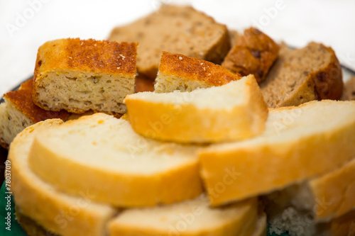 Slices of bread lying on a plate. Isolated
